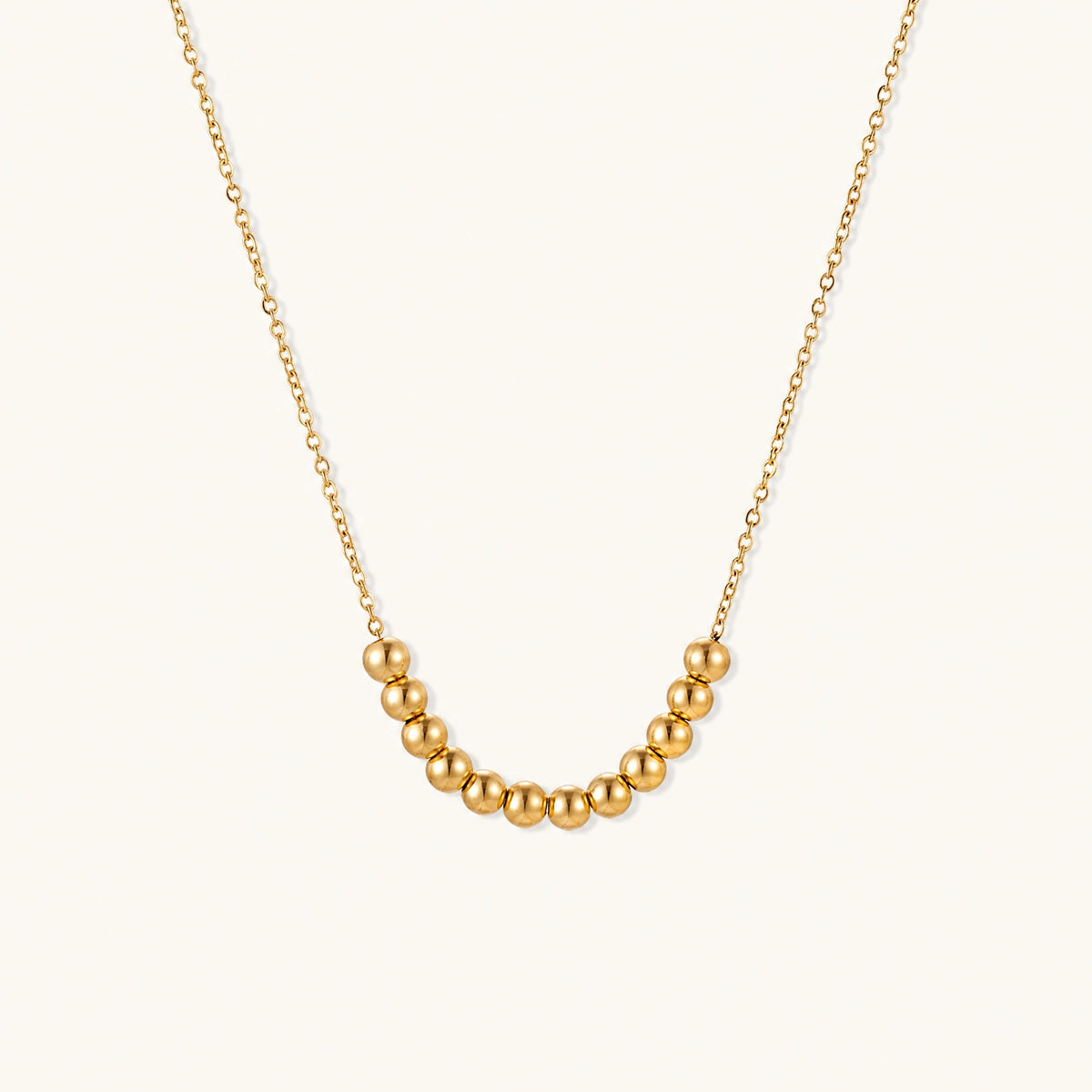 Collier Sphère Dorée — détail du bijou